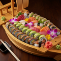 Sushi and sashimi catering boat with assorted rolls